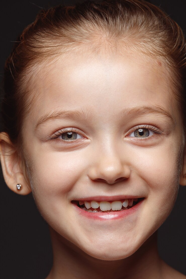 Почему чернеют зубы у детей